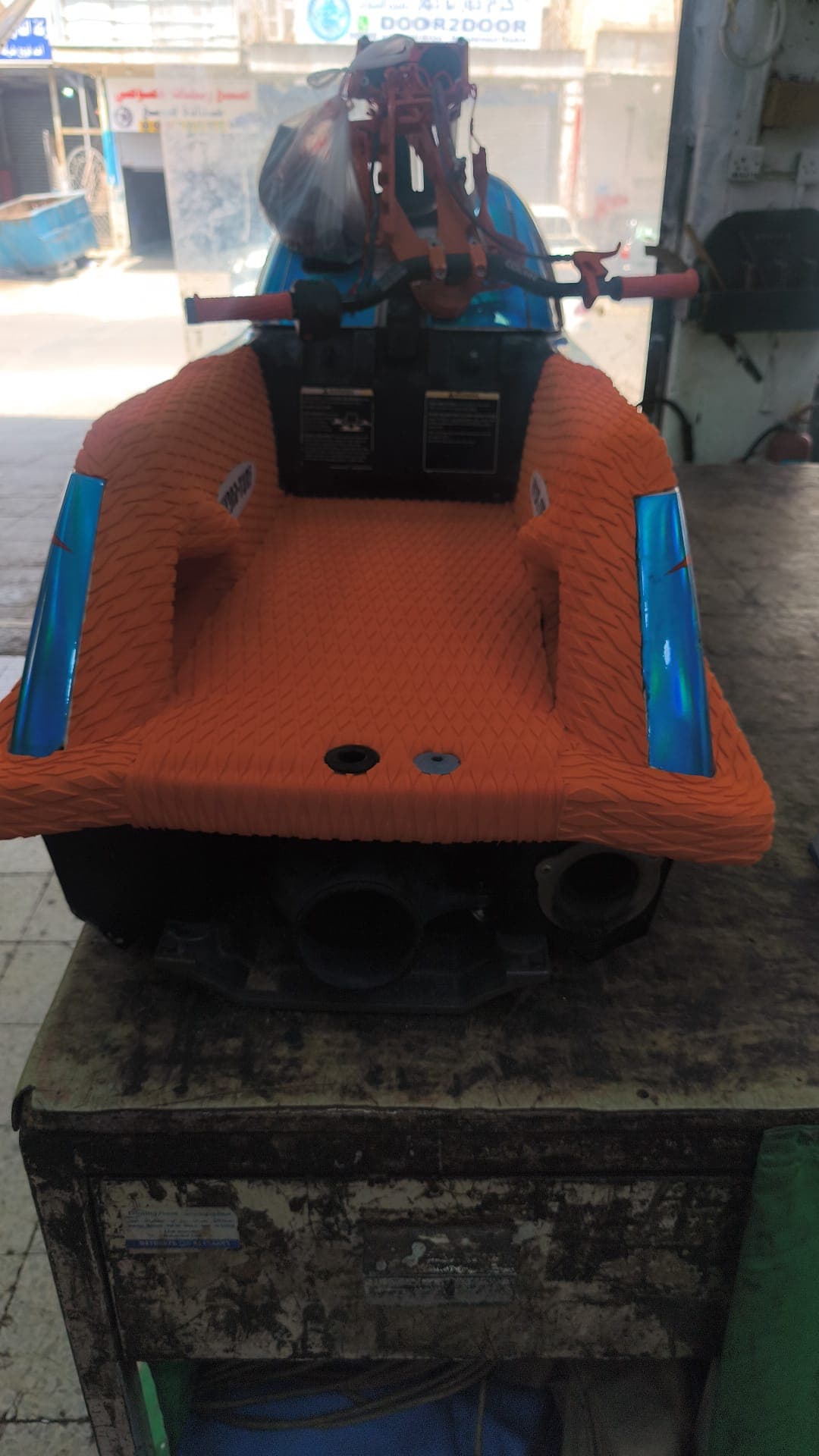 Non-slip floor mat covering the footwell and side panels of a jet ski by Shakeel Marine in Kuwait