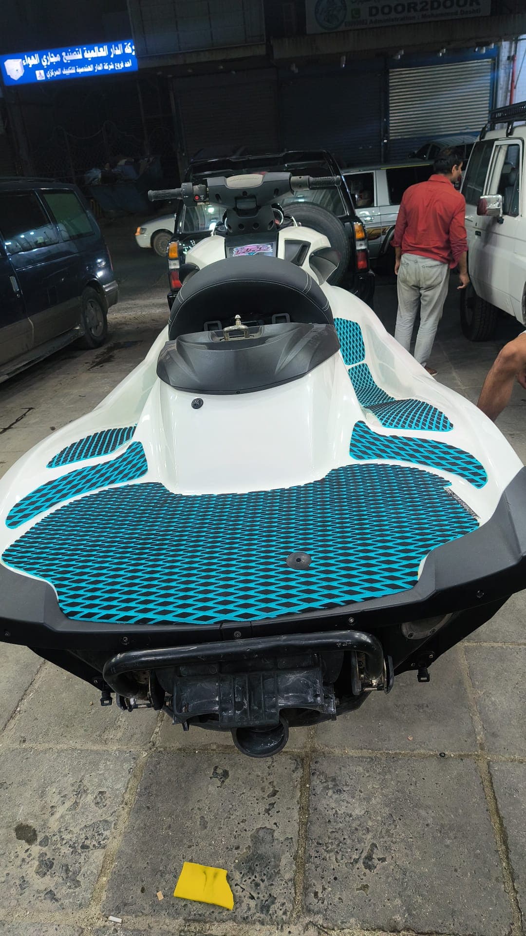 Custom floor mat fitted to the front and side sections of a jet ski by Shakeel Marine in Kuwait